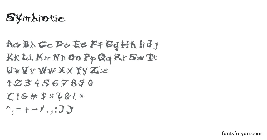 Czcionka Symbiotic – alfabet, cyfry, specjalne znaki