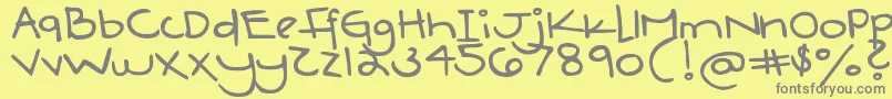 DjbBoyfriendJeans-Schriftart – Graue Schriften auf gelbem Hintergrund