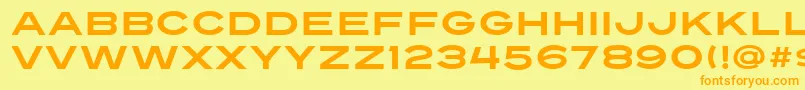 フォントTurnpike – オレンジの文字が黄色の背景にあります。