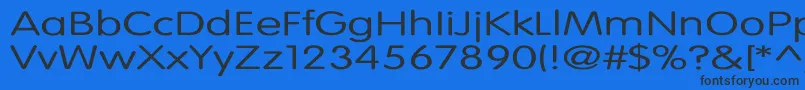 VogueNormalEx-Schriftart – Schwarze Schriften auf blauem Hintergrund