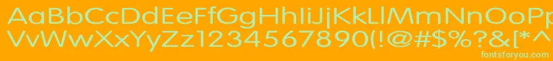 VogueNormalEx-Schriftart – Grüne Schriften auf orangefarbenem Hintergrund
