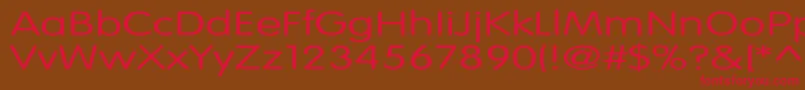 フォントVogueNormalEx – 赤い文字が茶色の背景にあります。