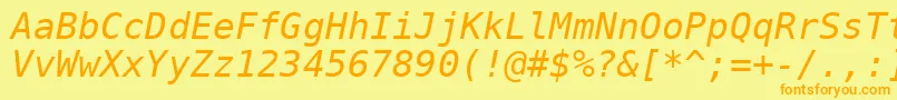 フォントDejavuSansMonoOblique – オレンジの文字が黄色の背景にあります。