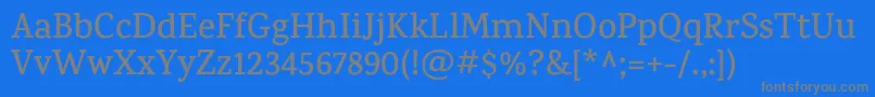 KarmaSemibold-Schriftart – Graue Schriften auf blauem Hintergrund