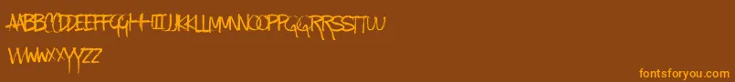 KindaMessy Font – Orange Fonts on Brown Background