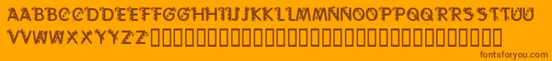 フォントKrCaneLetters – オレンジの背景に茶色のフォント