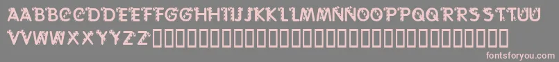 フォントKrCaneLetters – 灰色の背景にピンクのフォント
