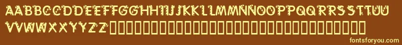 KrCaneLetters-fontti – keltaiset fontit ruskealla taustalla