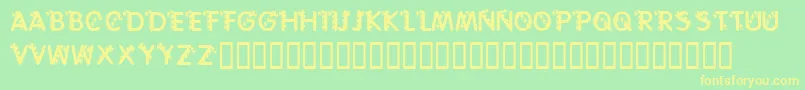 フォントKrCaneLetters – 黄色の文字が緑の背景にあります