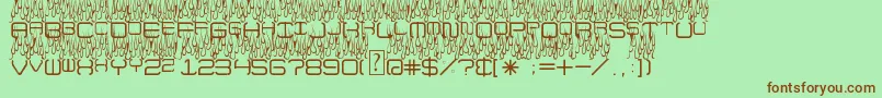 UpInFlames-fontti – ruskeat fontit vihreällä taustalla