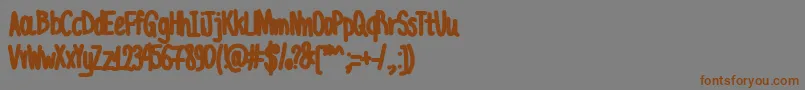 AcChubbyUnicode-Schriftart – Braune Schriften auf grauem Hintergrund