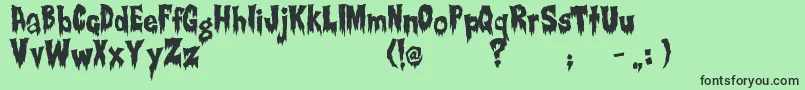 Creepsville-Schriftart – Schwarze Schriften auf grünem Hintergrund