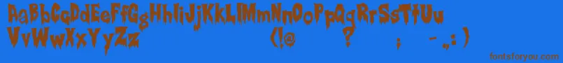 フォントCreepsville – 茶色の文字が青い背景にあります。
