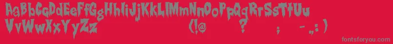 Fonte Creepsville – fontes cinzas em um fundo vermelho