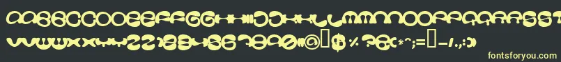 Stoopid Font – Yellow Fonts on Black Background