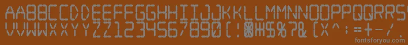 Шрифт Digital Dream Fat Narrow – серые шрифты на коричневом фоне
