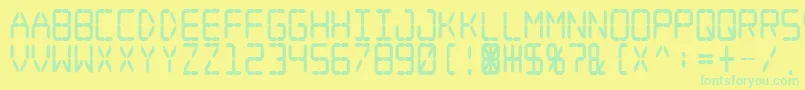 Digital Dream Fat Narrow Font – Green Fonts on Yellow Background
