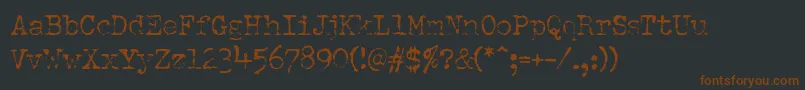PfdumboldtypewriterOneLight Font – Brown Fonts on Black Background