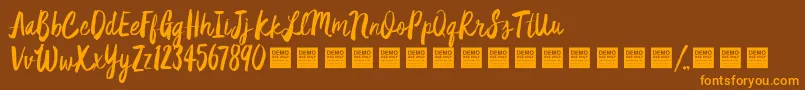 StarDustDemo-fontti – oranssit fontit ruskealla taustalla