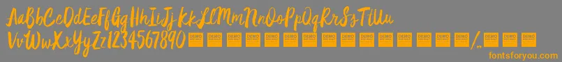 StarDustDemo Font – Orange Fonts on Gray Background