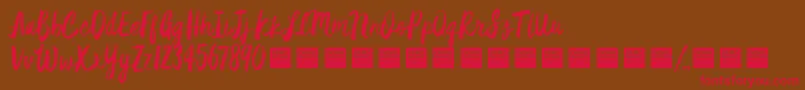 StarDustDemo-Schriftart – Rote Schriften auf braunem Hintergrund