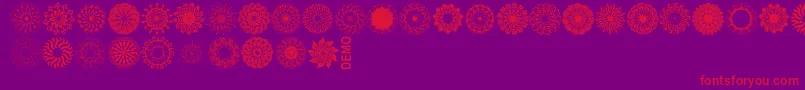 Mandingsdemo-Schriftart – Rote Schriften auf violettem Hintergrund