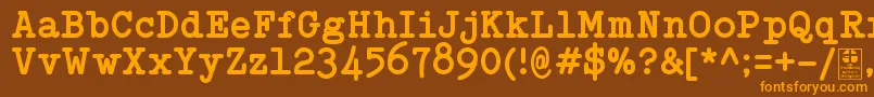 フォントTypowriterBoldDemo – オレンジ色の文字が茶色の背景にあります。