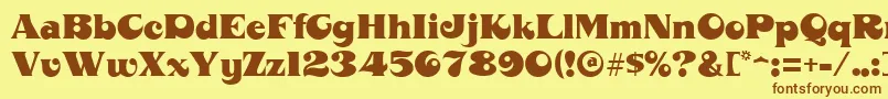 フォントMahoneyRegular – 茶色の文字が黄色の背景にあります。