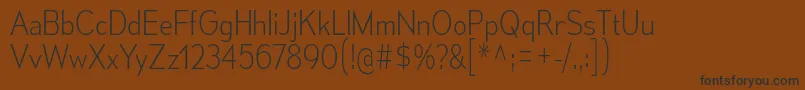 MesmerizeScEl Font – Black Fonts on Brown Background