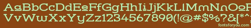 フォントStrslupw – 緑色の文字が茶色の背景にあります。