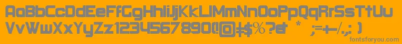 RoundBold-fontti – harmaat kirjasimet oranssilla taustalla