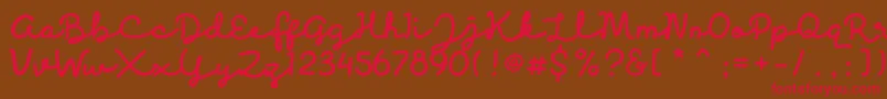 Discobaby-Schriftart – Rote Schriften auf braunem Hintergrund