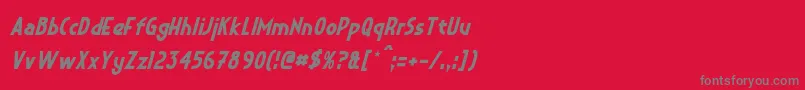 CrystalDecoItalic-fontti – harmaat kirjasimet punaisella taustalla