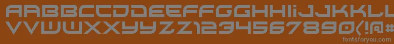 Xirod-fontti – harmaat kirjasimet ruskealla taustalla