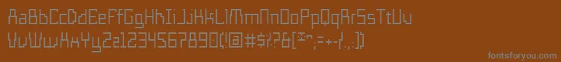 TemploFino-fontti – harmaat kirjasimet ruskealla taustalla