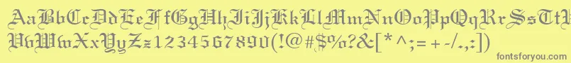 フォントLinotext – 黄色の背景に灰色の文字