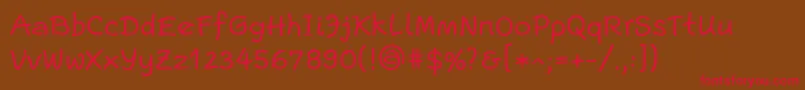 EscriptLl Font – Red Fonts on Brown Background