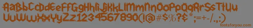 フォントDu30 – 茶色の文字が灰色の背景にあります。