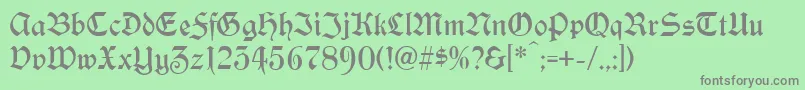 Yonkers Font – Gray Fonts on Green Background