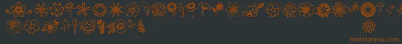 Jandaflowerdoodles-fontti – ruskeat fontit mustalla taustalla