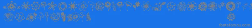 Jandaflowerdoodles-fontti – harmaat kirjasimet sinisellä taustalla