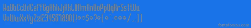 フォントBelushiRegularDb – 青い背景に灰色の文字