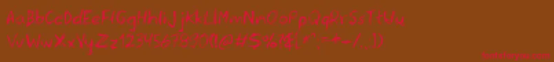 フォントSerena – 赤い文字が茶色の背景にあります。