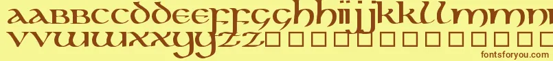 フォントKellunc – 茶色の文字が黄色の背景にあります。