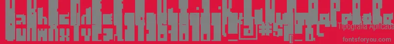 RegulusCubiculus-Schriftart – Graue Schriften auf rotem Hintergrund