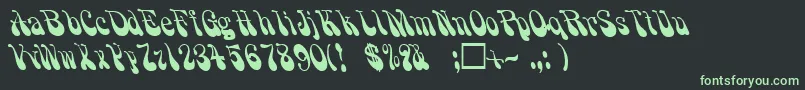 フォントPsychadelicRegular – 黒い背景に緑の文字