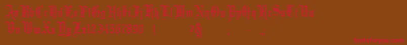 Minster5 Font – Red Fonts on Brown Background