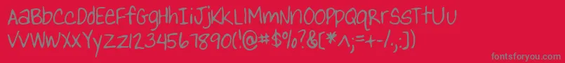 YankshandRegular-Schriftart – Graue Schriften auf rotem Hintergrund