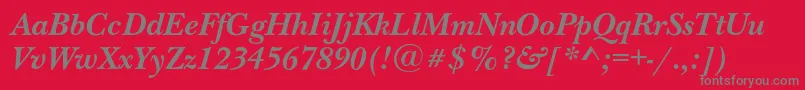 NewbaskervillecBolditalic-Schriftart – Graue Schriften auf rotem Hintergrund