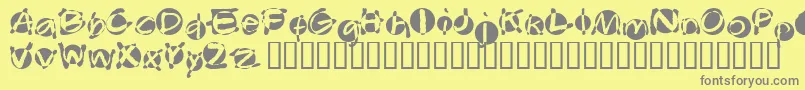 Swabba-fontti – harmaat kirjasimet keltaisella taustalla